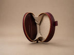 AURA-MINI POUCH EN CUERO VINO