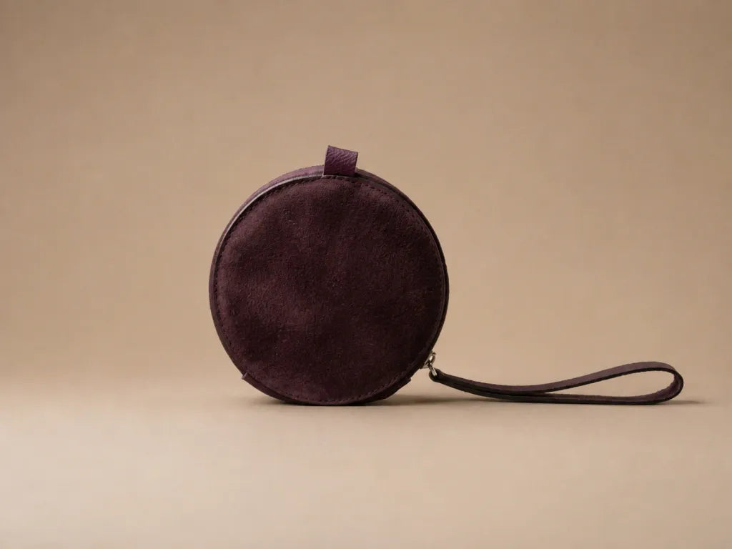 AURA-MINI POUCH EN CUERO VINO