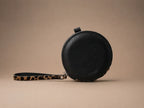 AURA-MINI POUCH EN CUERO CHEETAH